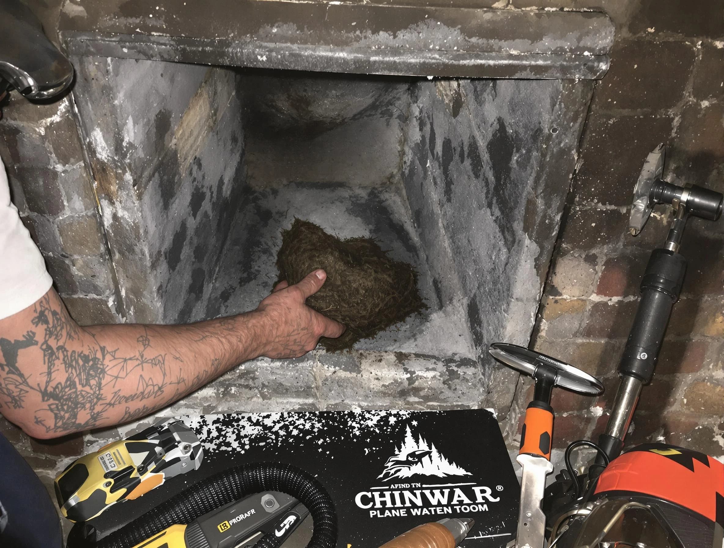 Corrales Chimney Sweep safely removing debris and screening chimney in Corrales, NM